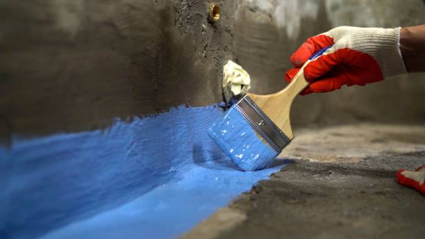 SJ Waterproofing Pros commercial waterproofing team near Woodville, AL